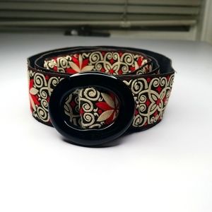 Patterned, woven belt.